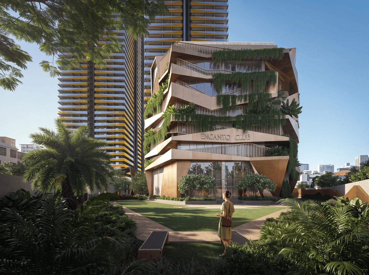 Encanto's eight-storey clubhouse with layered terraces and greenery, lit at dusk